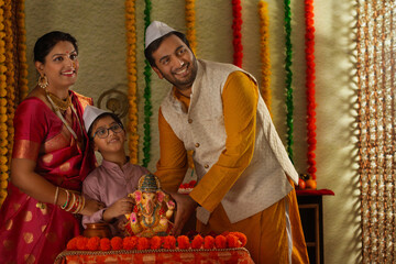 A family setting up the Ganesh idol on the eve of Ganesh chathurthi